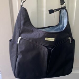 Baggallini cross body or shoulder bag. Baby blue interior.